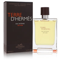 Dark green glass bottle of Terre d'Hermès Eau Intense Vétiver Eau de Parfum spray 3.3 oz by The Fragrance Avenue.