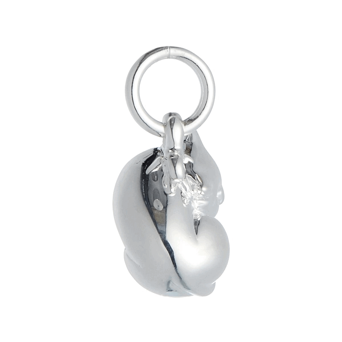 A silver cat charm with intricate detailing, displayed on a soft fabric background, by Scarlett Jewellery.