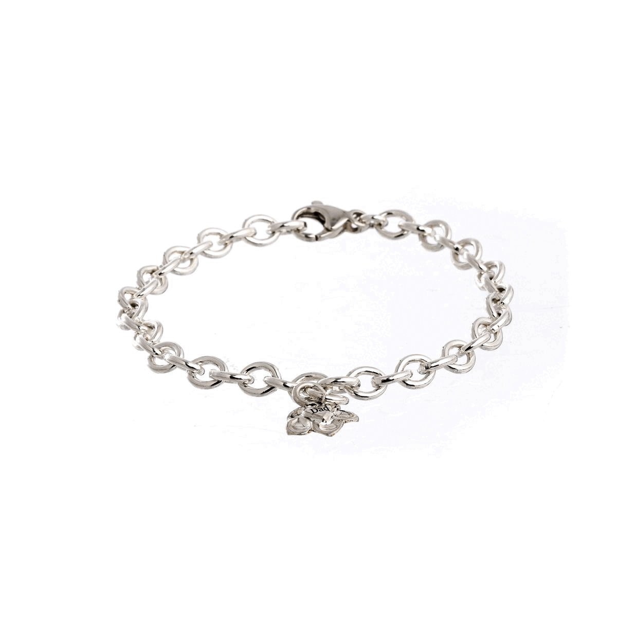 A silver personalised charm bracelet with a forget-me-not design worn on the wrist by Scarlett Jewellery.