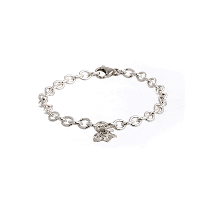A silver personalised charm bracelet with a forget-me-not design worn on the wrist by Scarlett Jewellery.