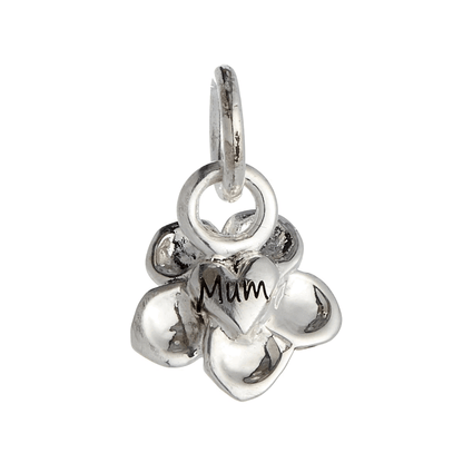 Silver forget-me-not flower charm with personalized engraving, displayed on a velvet background by Scarlett Jewellery.