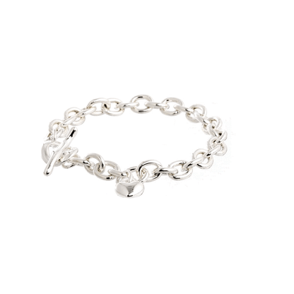 Silver heart charm bracelet with delicate chain and intricate detailing by Scarlett Jewellery.