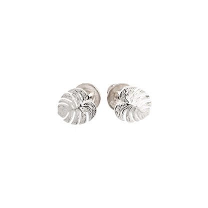 Silver stud earrings featuring a detailed monstera palm leaf design by Scarlett Jewellery.