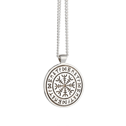 A silver Viking rune necklace with personalized engraving, displayed on a wooden table against a neutral background, by Scarl