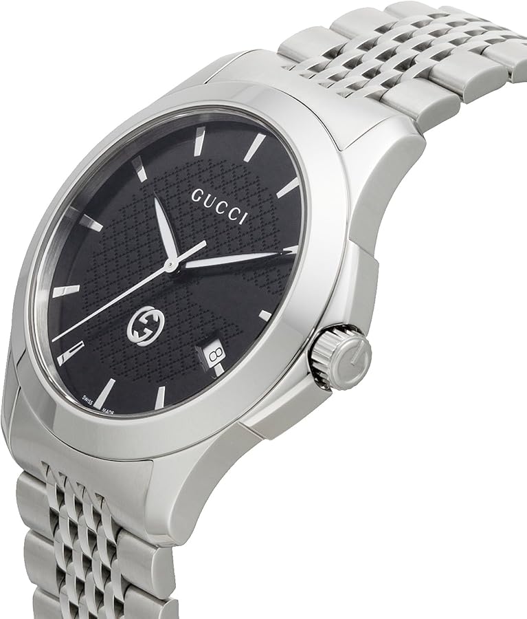 Silver dial with black Roman numerals on a stainless steel watch face, featuring a leather strap and Gucci logo at 12 o'clock