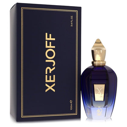 A clear glass bottle with a black cap and gold label labeled "40 Knots" by Xerjoff, standing on a white surface.