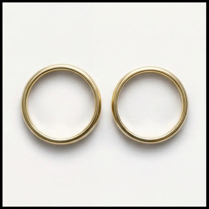 A 3mm gold wedding band featuring a classic lyra design in 9ct gold, displayed on a neutral background by Majestic Jewellery.