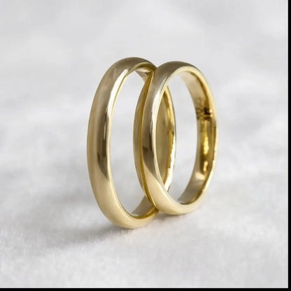 A 3mm gold wedding band featuring a classic lyra design in 9ct gold, displayed on a white background by Majestic Jewellery.