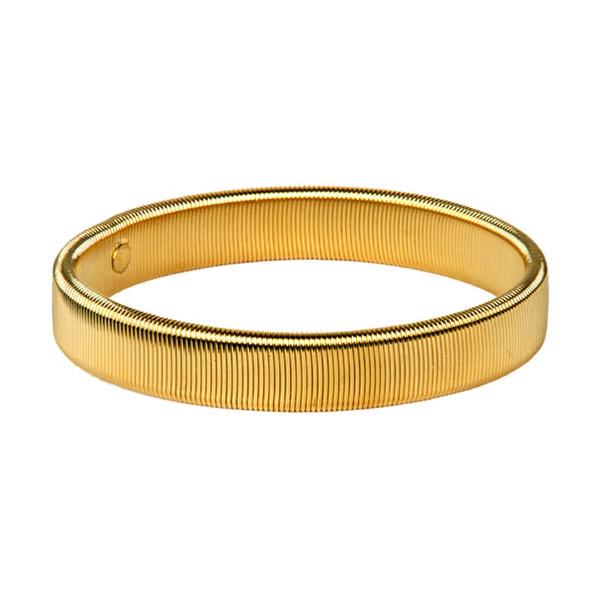 Gold shirt armbands with a sleek design, featuring the Benson & Clegg logo, worn on a man's forearm.