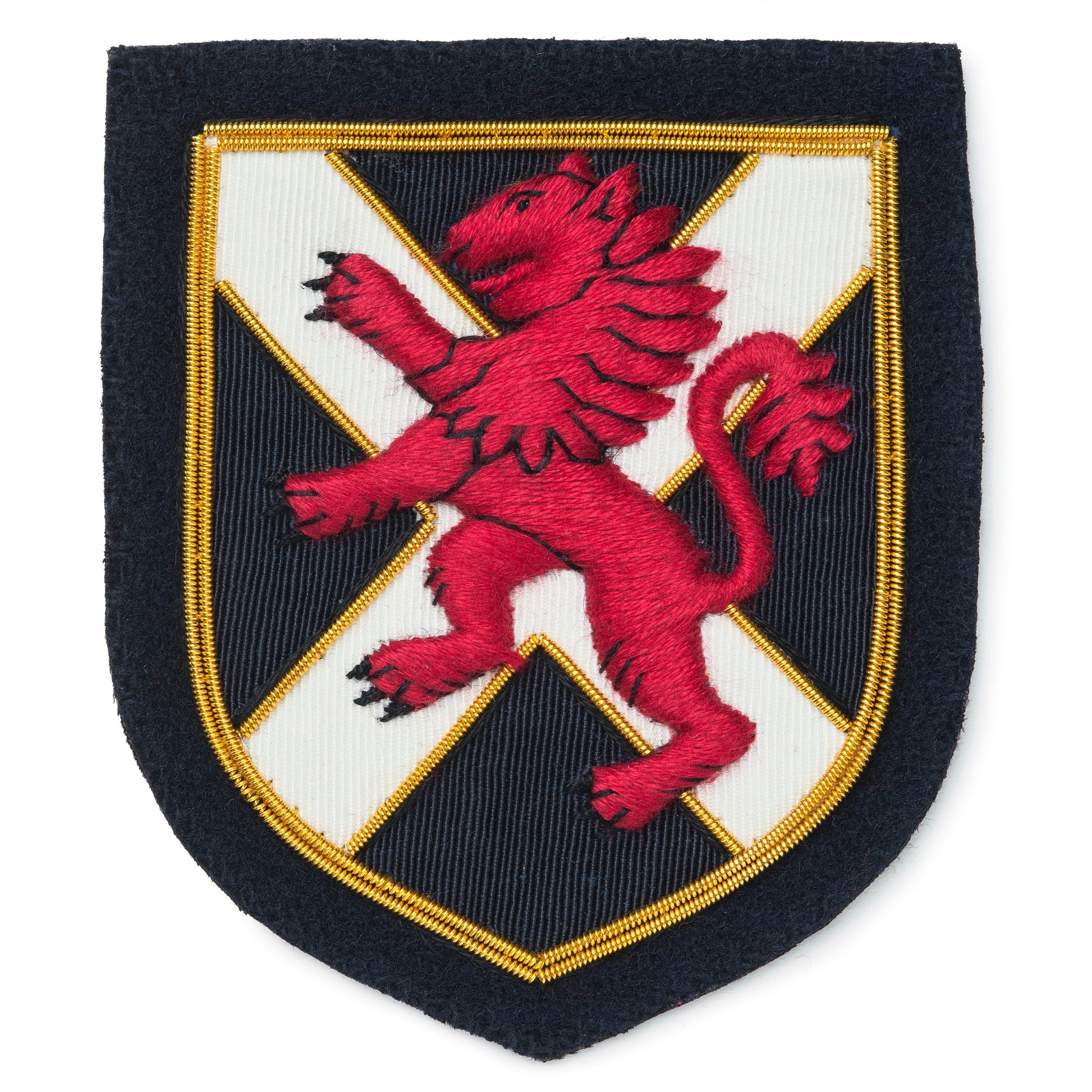 A brass Scottish lion blazer badge with a black background, featuring the Benson & Clegg logo.
