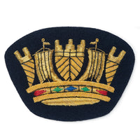 Royal naval coronet blazer badge in gold finish with detailed embroidery by Benson & Clegg.