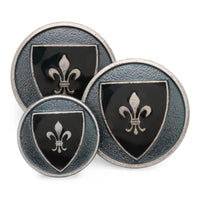A blue enamel heraldic shield blazer button with a metallic border and detailed engraving by Benson & Clegg.