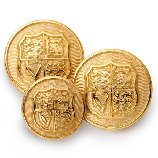 Black blazer button with gold detailing, displayed on a white background, part of the British Arms collection by Benson & Cle