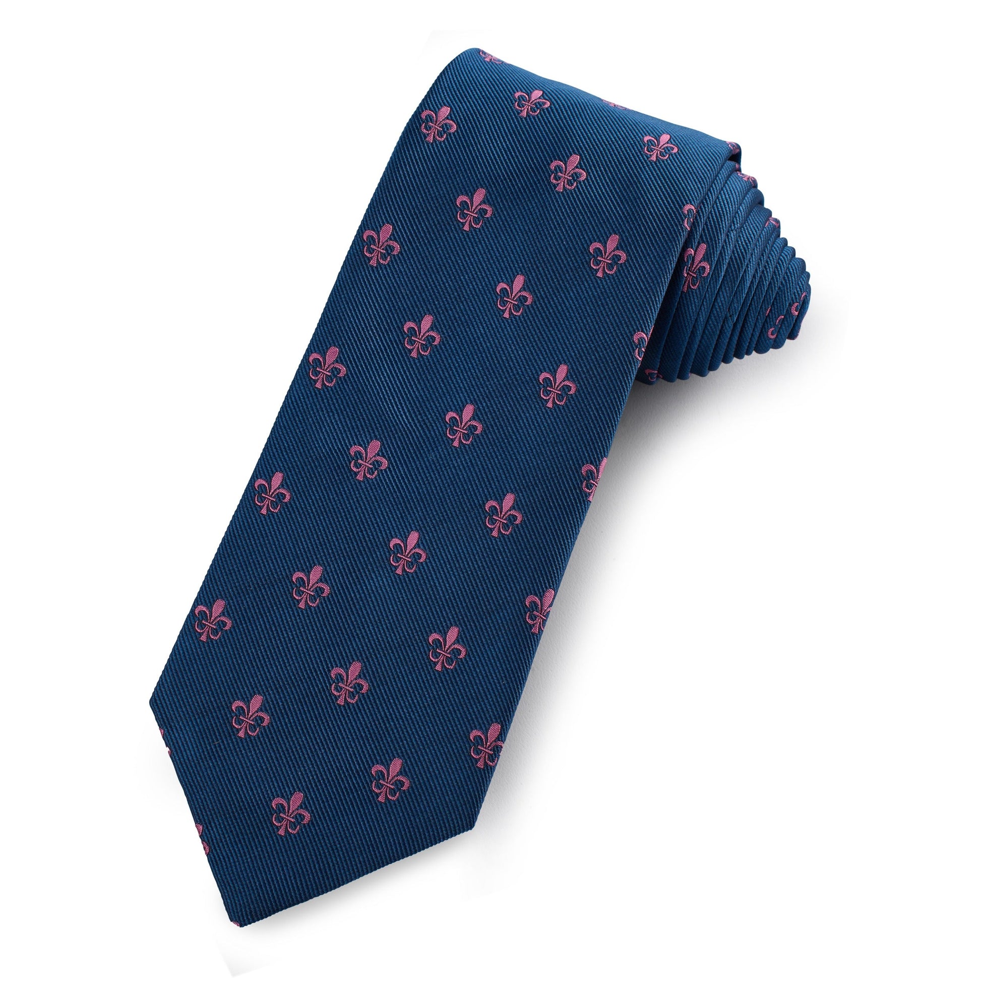 A silk tie featuring a fleur de lys pattern in navy blue, shown folded neatly on a white background, by Benson & Clegg.