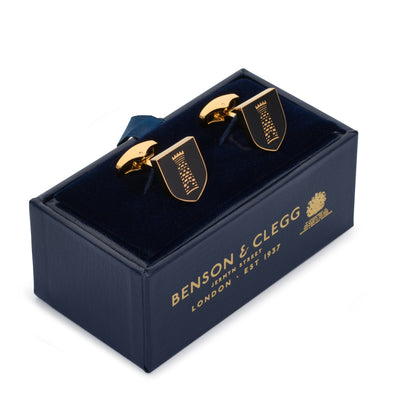 Black onyx cufflinks featuring a heraldic tower shield design by Benson & Clegg.