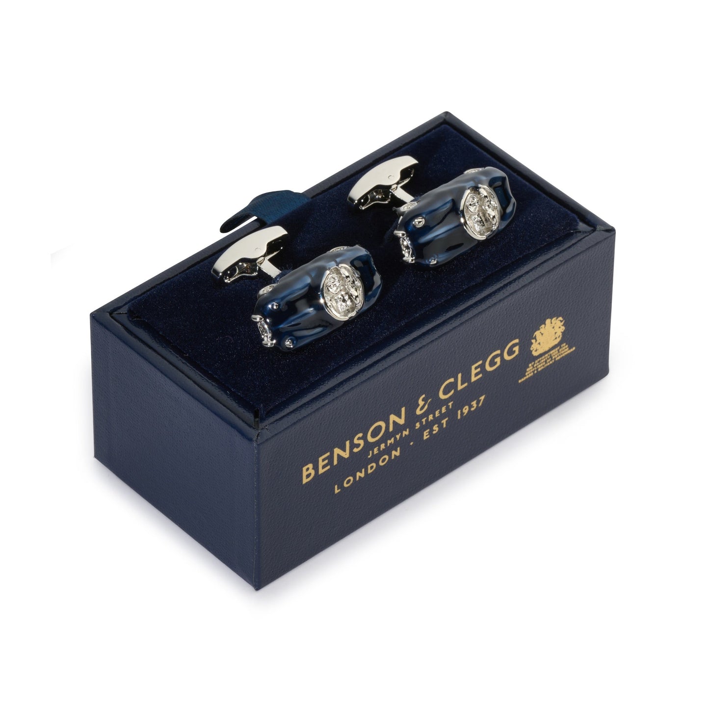 Black metal cufflinks with a sleek design worn on a formal shirt by Benson & Clegg.