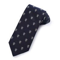 A navy silk tie with a bold lion pattern, displayed horizontally against a white background, by Benson & Clegg.