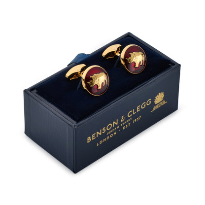 Red rhino-shaped cufflinks with polished silver accents, displayed on a black background.