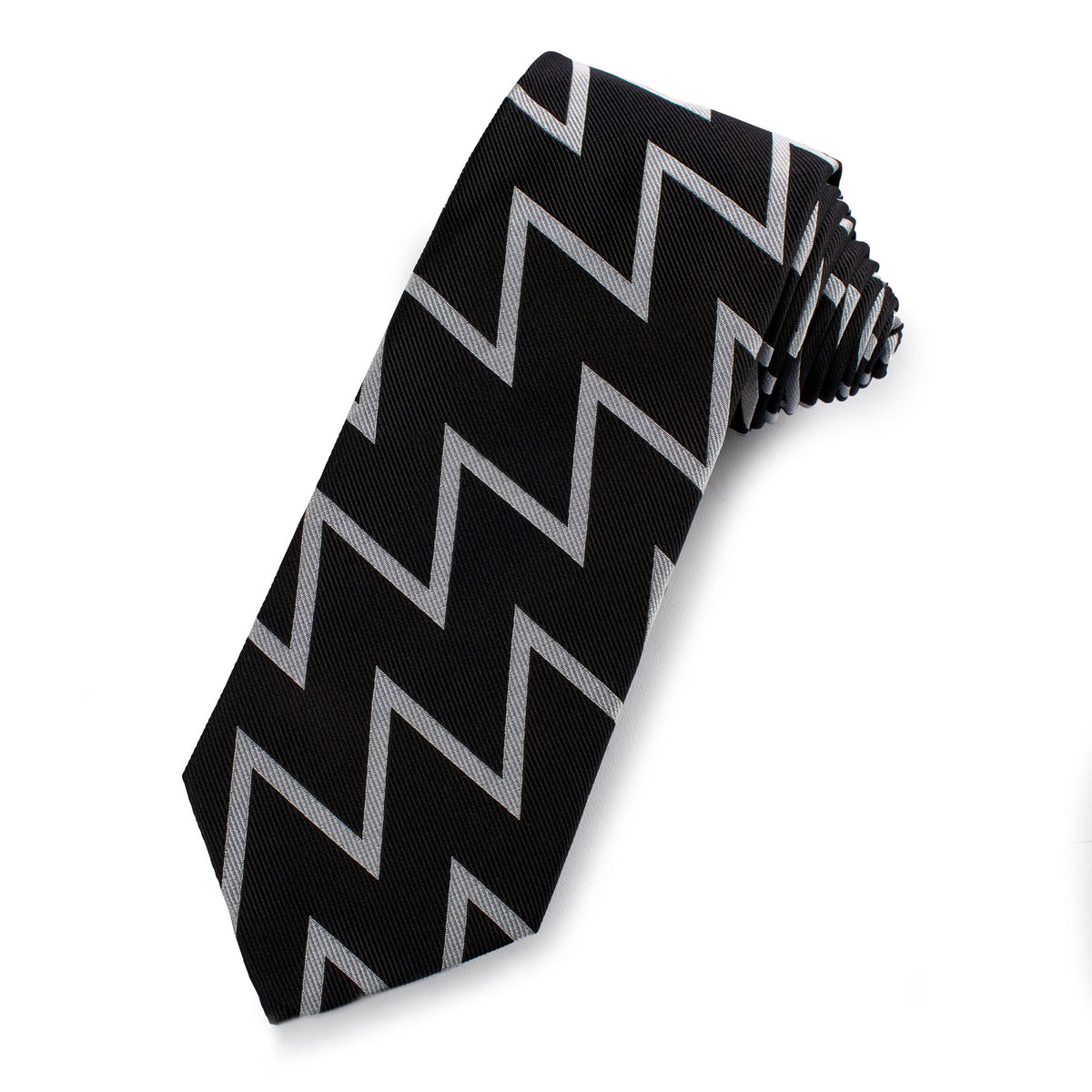 Black and silver silk tie with subtle sheen, styled around a collar, by Benson & Clegg.