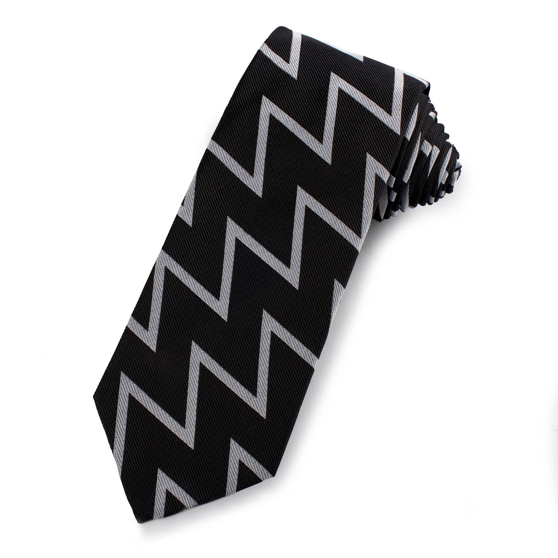 Black and silver silk tie with subtle sheen, styled around a collar, by Benson & Clegg.