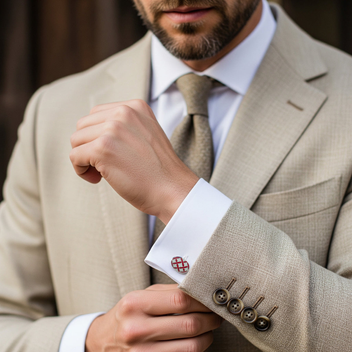 Sterling silver cufflinks with cream accents in a polished finish by Benson & Clegg.