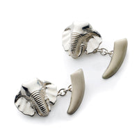 Sterling silver elephant head and tusk cufflinks with detailed engraving by Benson & Clegg.