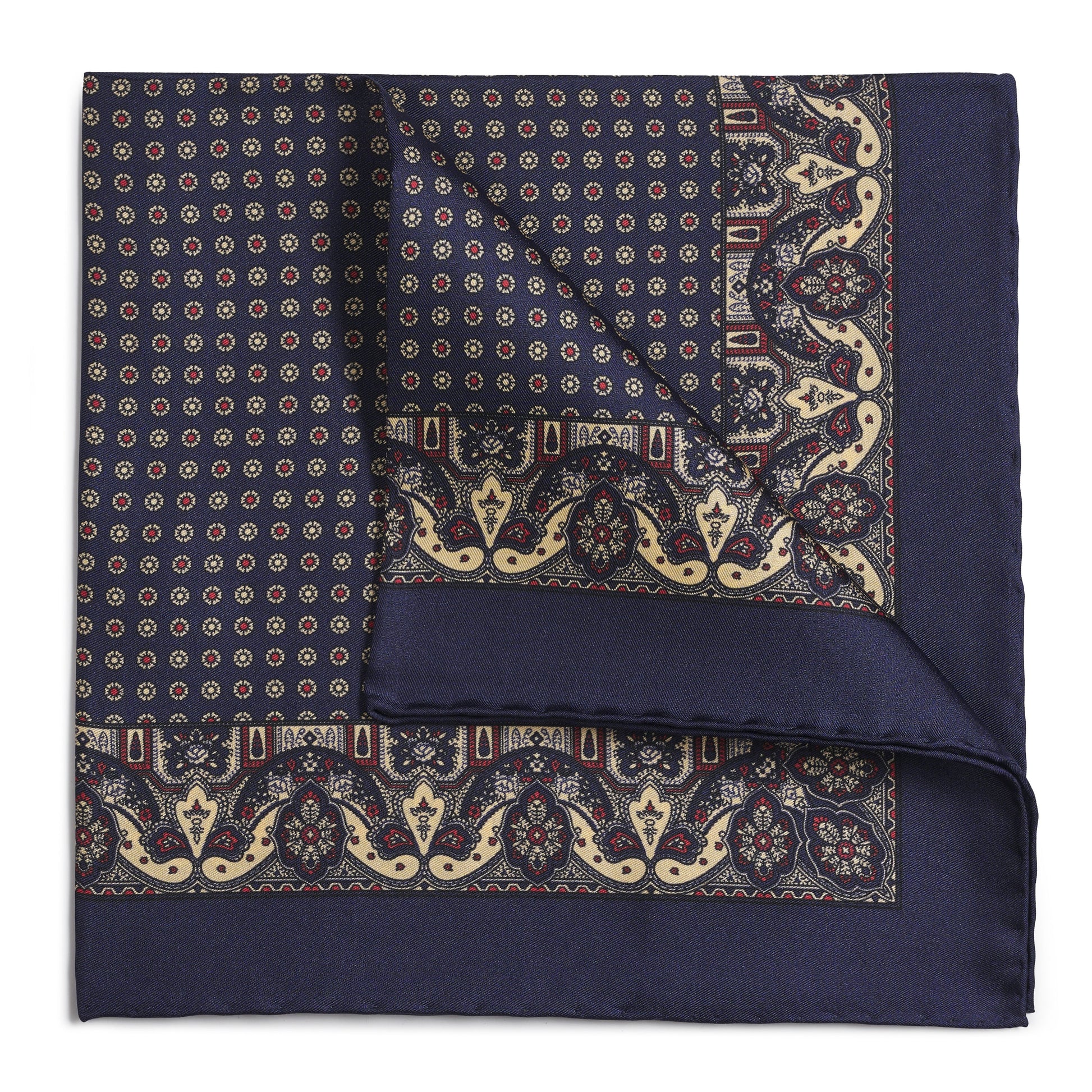 Navy silk pocket square with intricate paisley pattern, detailed embroidery, and ornate design by Benson & Clegg.