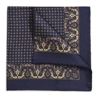 Navy silk pocket square with intricate paisley pattern, detailed embroidery, and ornate design by Benson & Clegg.