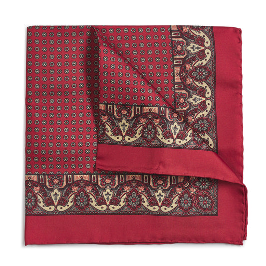 Red ornate paisley silk pocket square with intricate pattern and delicate detailing by Benson & Clegg