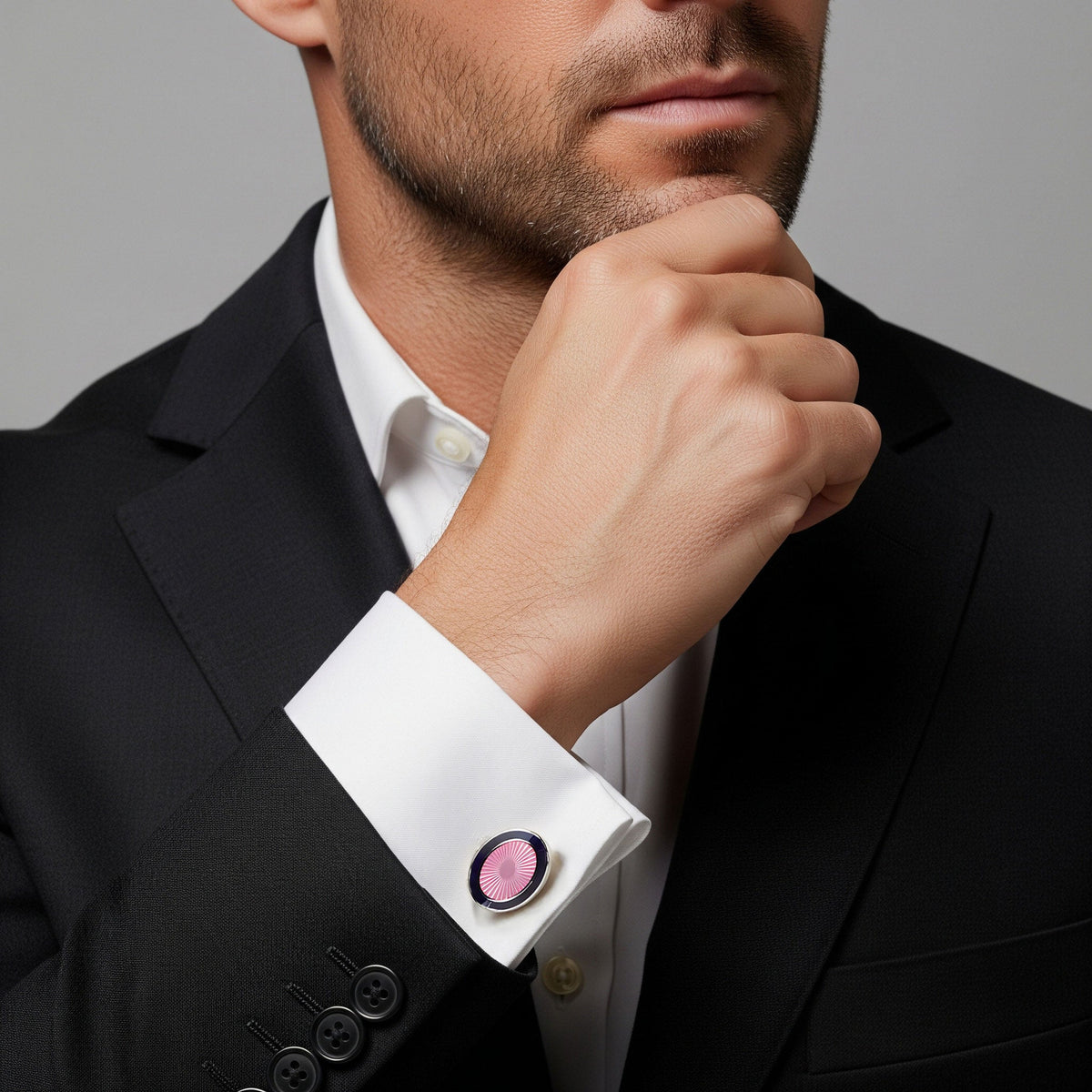 Pink bloom enamel cufflinks with a sunburst design by Benson & Clegg