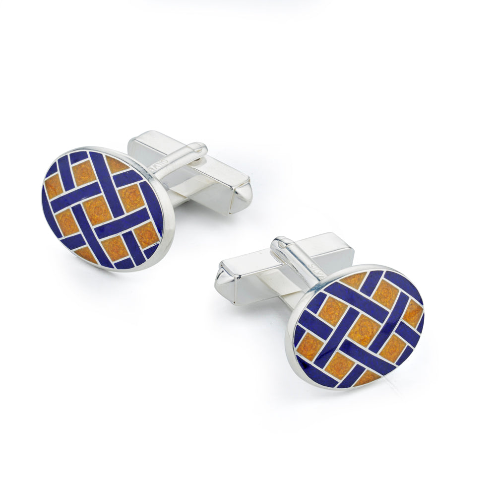 Yellow sterling silver Weave cufflinks with a textured finish, displayed on a black stand by Benson & Clegg.