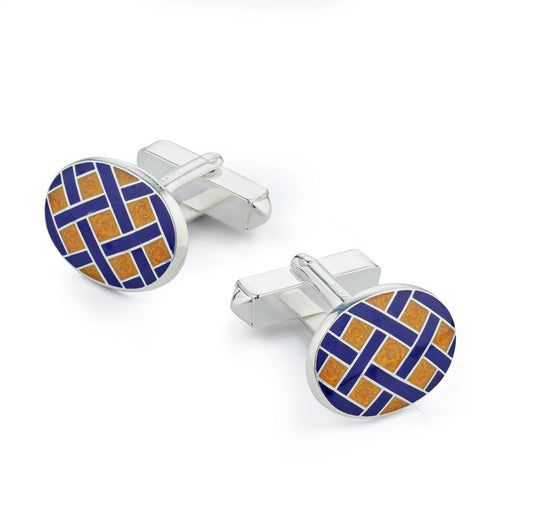 Yellow sterling silver Weave cufflinks with a textured finish, displayed on a black stand by Benson & Clegg.