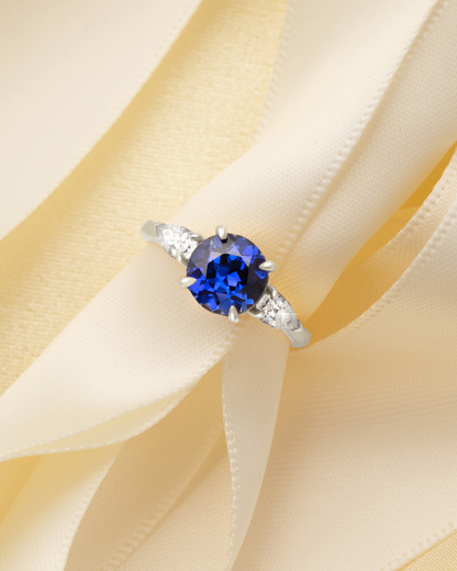 Blue Sapphire Round Cut Three Stone Engagement Ring in Sterling Silver - SJR London Timepiece