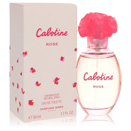 A pink glass bottle of Cabotine Rose Eau De Toilette spray for women by Parfums Gres on a white background.