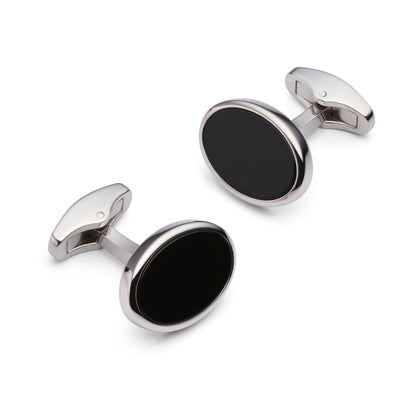 Silver onyx oval cufflinks with a polished finish, featuring a sleek design and subtle detailing by Benson & Clegg.