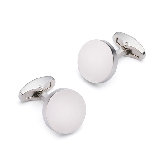 Silver round cufflinks with polished finish, styled on a white shirt cuff, by Benson & Clegg.