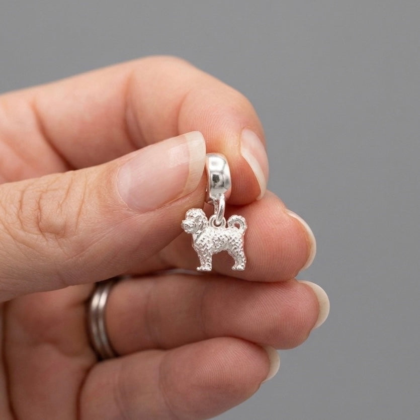 Silver dog-shaped charm with intricate detailing by Scarlett Jewellery
