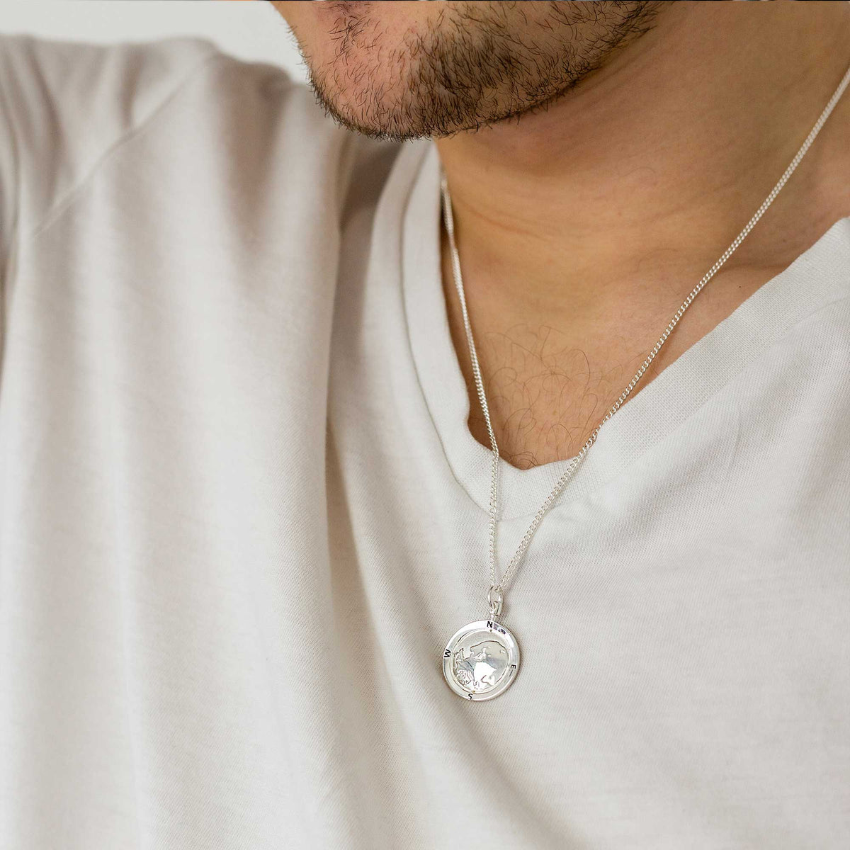 Silver chain necklace with Europe map globe pendant, personalized design by Scarlett Jewellery.