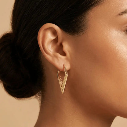 Solid gold geometric V-shaped hoop earrings in 14ct gold by Majestic Jewellery