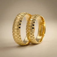 A 6mm gold wedding band with a mosaic textured finish in 9ct, 14ct, or 18ct gold by Majestic Jewellery