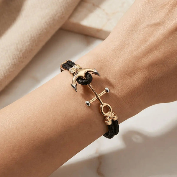 A nautical anchor bracelet with double braided design in 14ct gold by Majestic Jewellery.