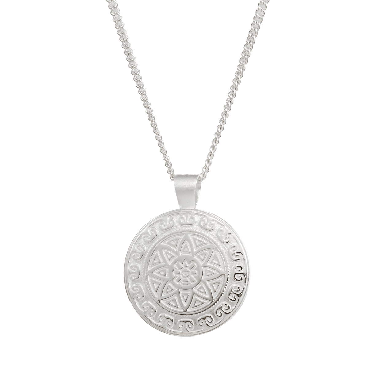 A silver mandala necklace with intricate Aztec design worn on a chain by Scarlett Jewellery.