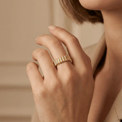 A solid gold ribbed texture wedding ring in 14ct gold by Majestic Jewellery