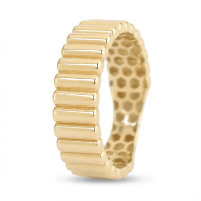 A solid gold ring with a ribbed texture in 14ct gold, shown as a modern wedding ring by Majestic Jewellery.