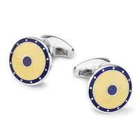 Domed guilloche sterling silver cufflinks in yellow with intricate pattern, featured on a black velvet background by Benson &