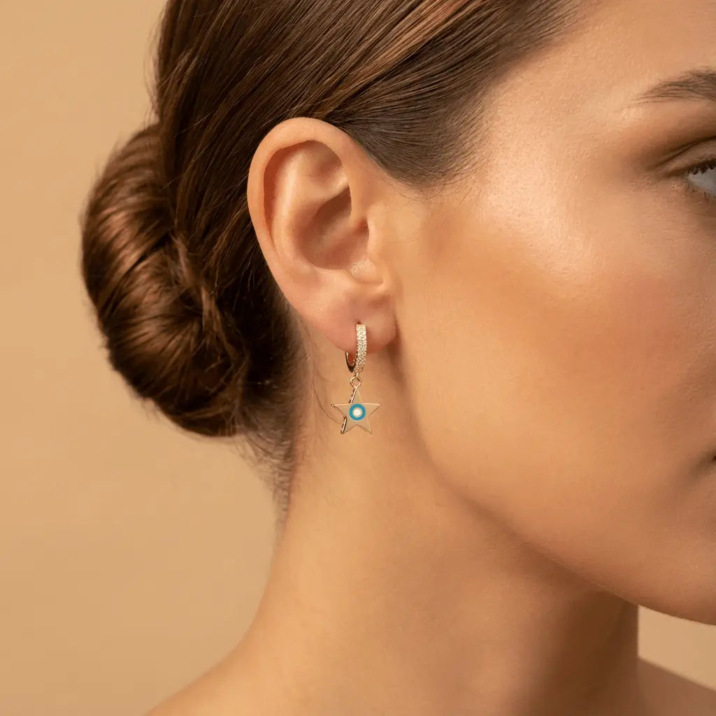 Gold hoop earrings with a star charm and turquoise detail, 14ct gold by Majestic Jewellery.