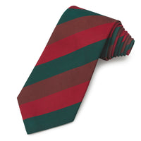 A deep navy three-fold silk reppe tie with a textured pattern, displayed on a white background by Benson & Clegg.
