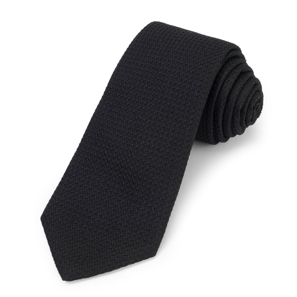 Black grenadine silk tie with subtle texture and polished finish by Benson & Clegg