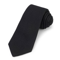 Black grenadine silk tie with subtle texture and polished finish by Benson & Clegg