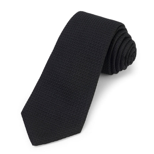 Black grenadine silk tie with subtle texture and polished finish by Benson & Clegg